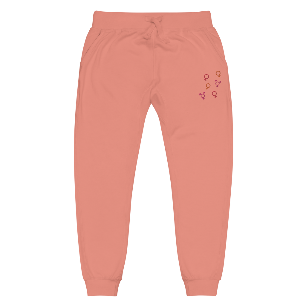 Front view of coral pink 'Girl Power' fleece jogger sweatpants with red, pink, and orange embroidered symbols by maillot.co