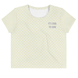 Open image in slideshow, Beige short-sleeve cropped t-shirt with white mini polka dot heart print &amp; grey &quot;IT&#39;S COOL TO CARE&quot; text at left pocket
